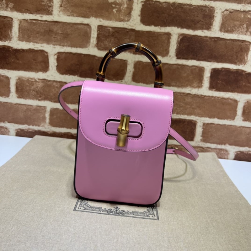 G*u*i top handle bags